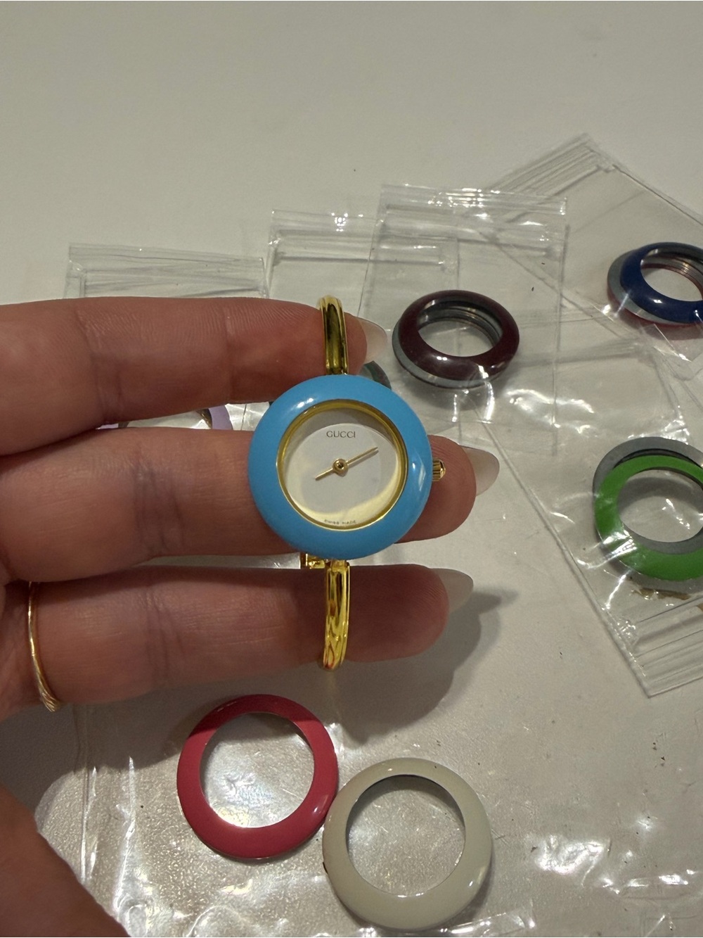 Gucci Vintage Gold Bangle Watch with Light Blue Interchangeable Bezel